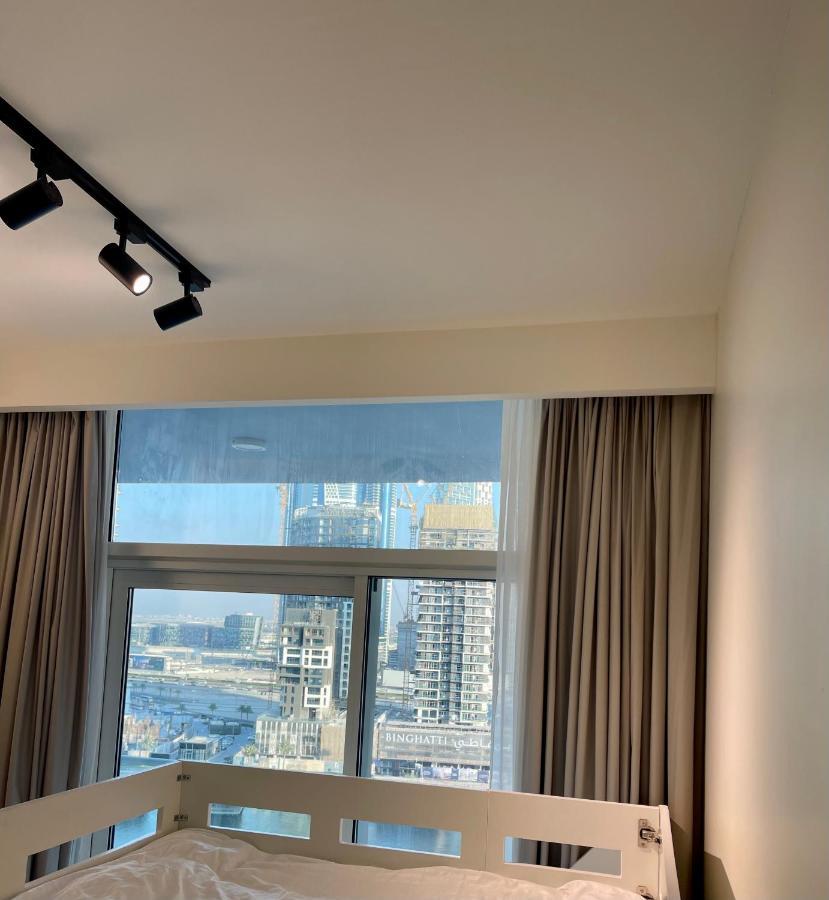 Апартаменти New Luxury Modern Canal View. Дубай Екстер'єр фото